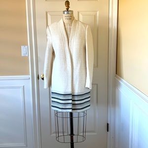 H&M Jacket, Long Blazer. Soft white boucle fabric with stitching along hemline.